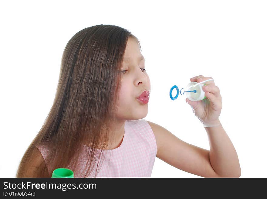 The portrait of little cute girl with soap-bubble