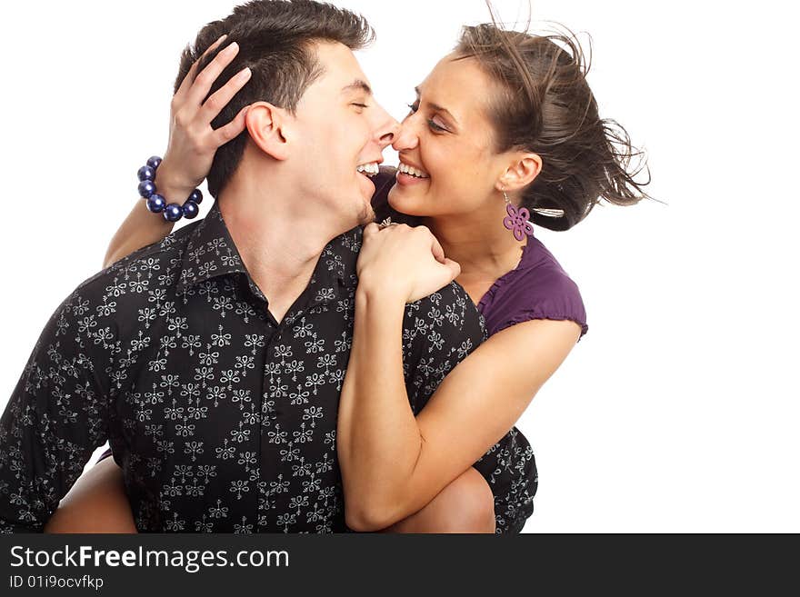 Happy young couple having fun, isolated on white