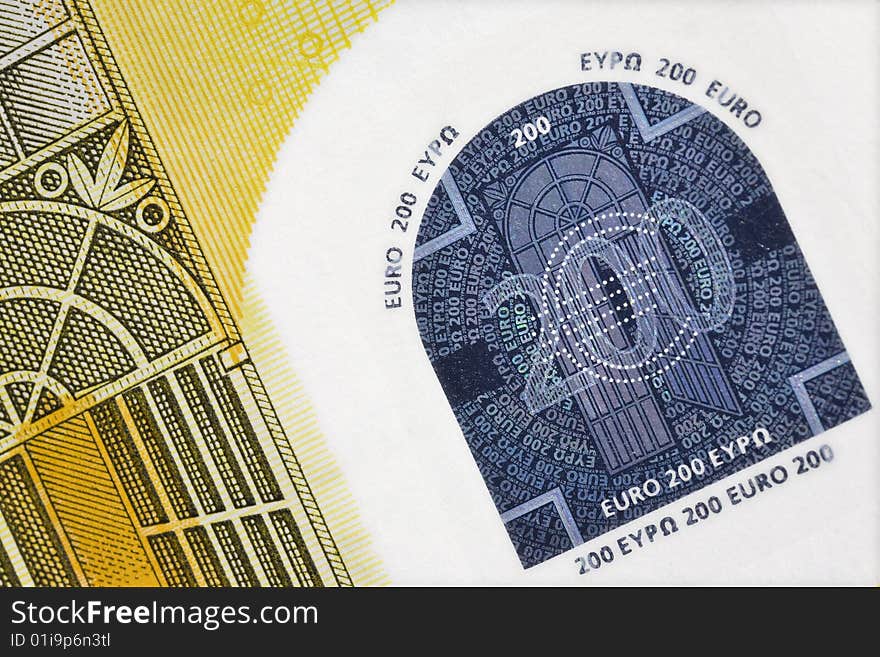 Greatly enlarged detail of a 200 euro banknote. Greatly enlarged detail of a 200 euro banknote