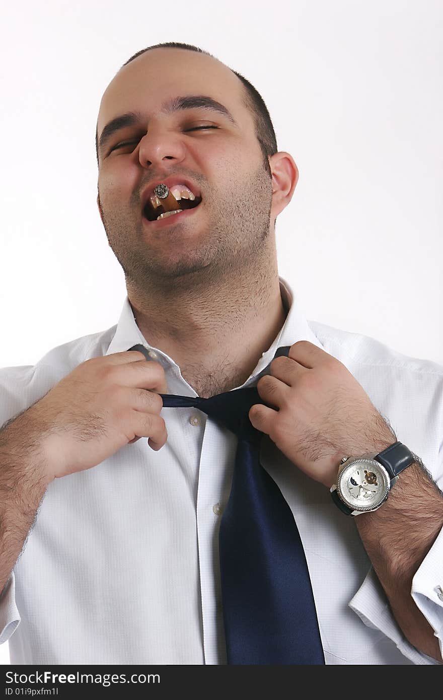 Drunk businessman untie his tie with cigarette in mouth