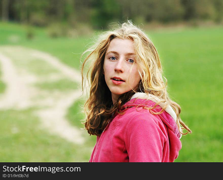 Pretty teenage girl in the countryside