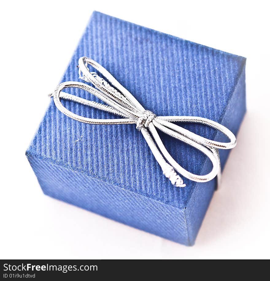 Blue box with silver ribbon. Blue box with silver ribbon