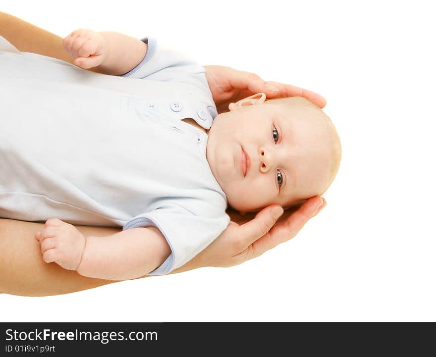 Baby in parent's hands over white