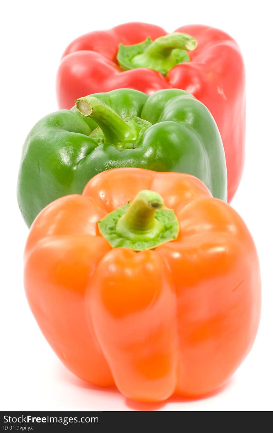 Close up on colorful paprika on white background