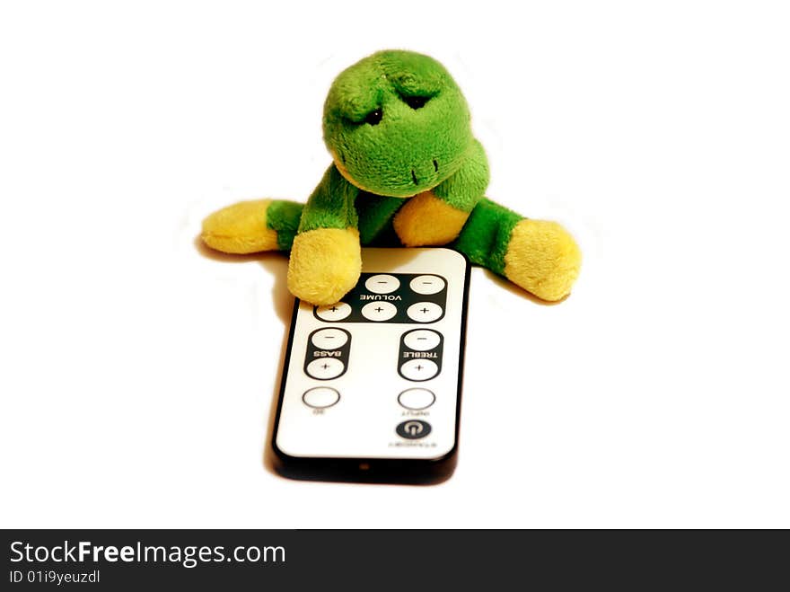 Fun frog with remote control isolated on a white background. Fun frog with remote control isolated on a white background