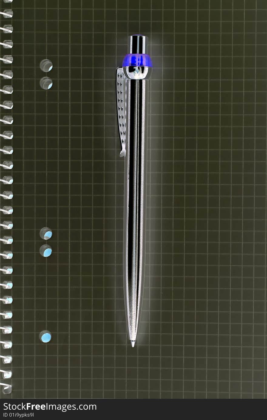 Unnatural ballpoint and notepad.