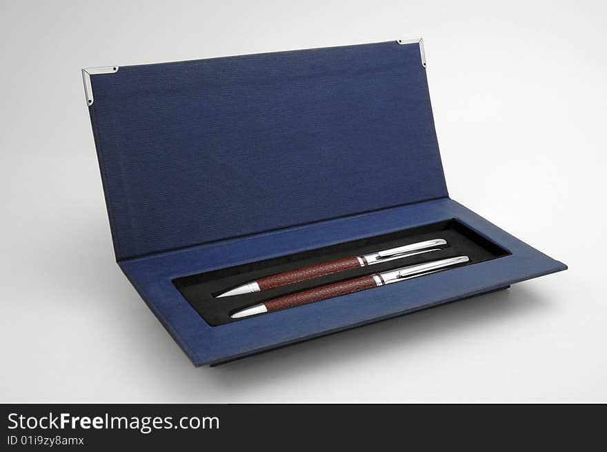 Luxury business pens in a opened blue case. Luxury business pens in a opened blue case