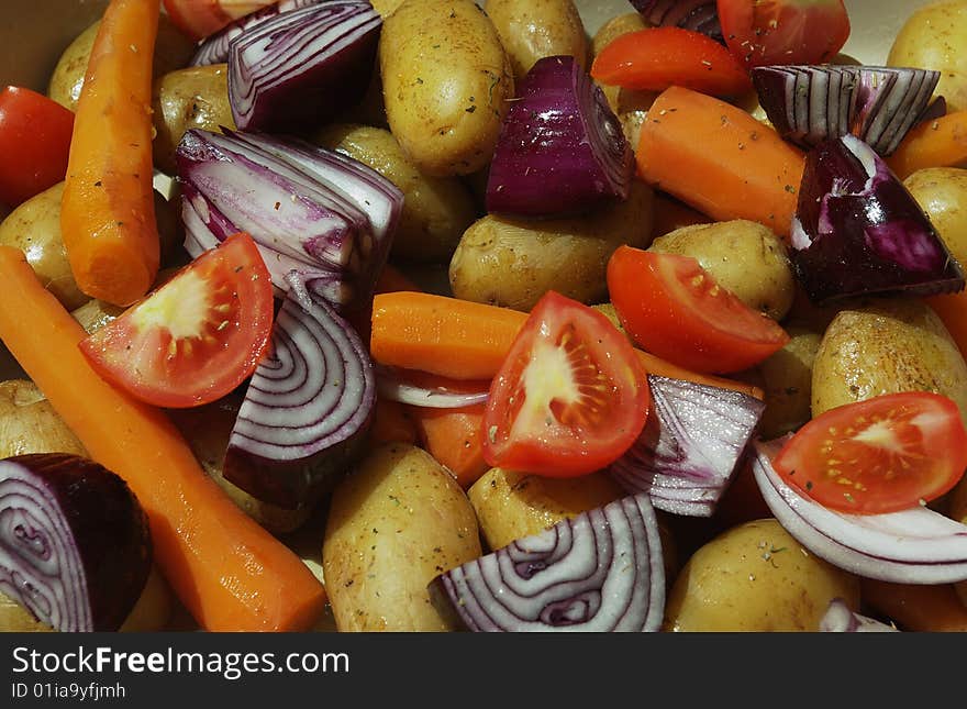 Carrot onion potato and tomato sliced and prepared. Carrot onion potato and tomato sliced and prepared