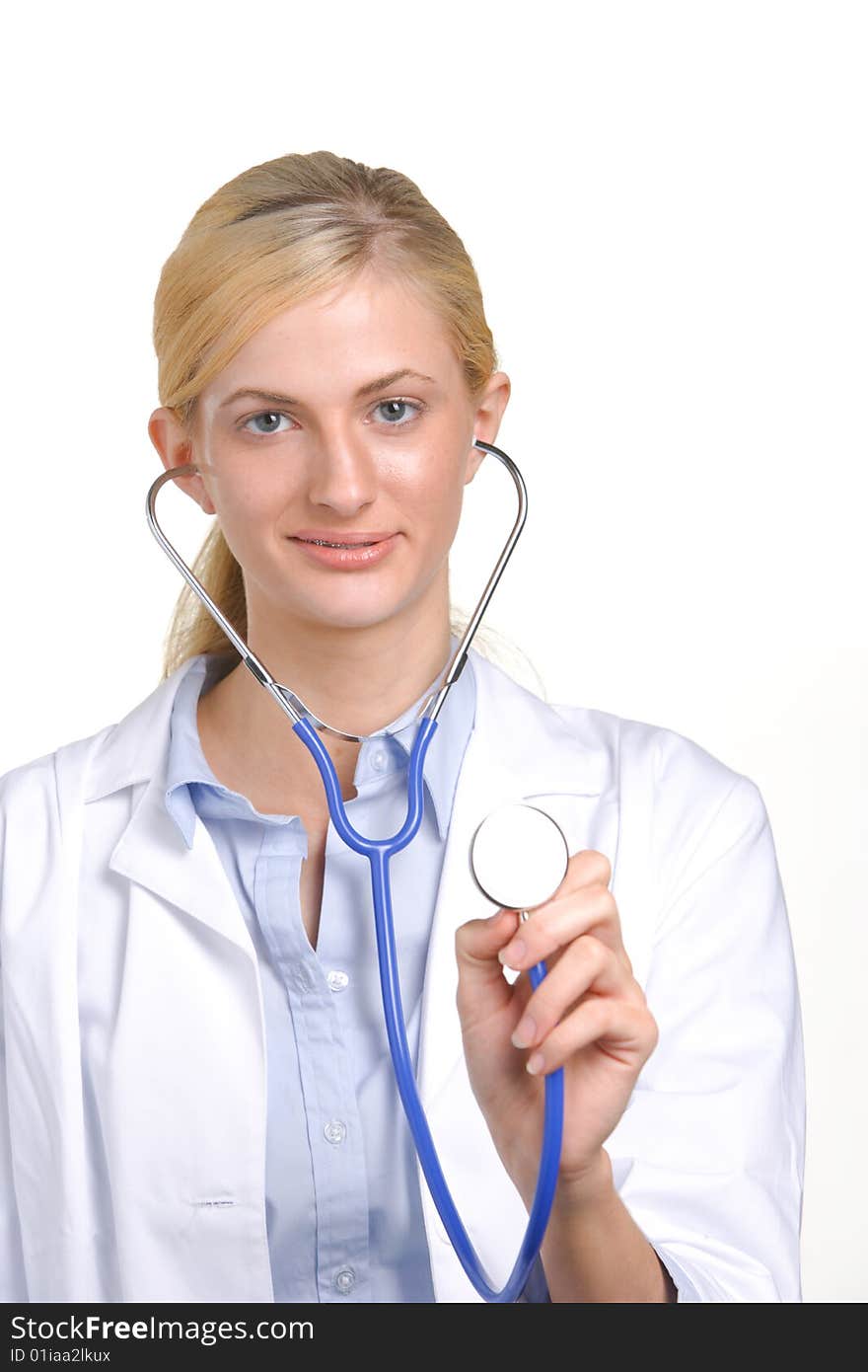 Woman doctor holding stethiscope isolated on white