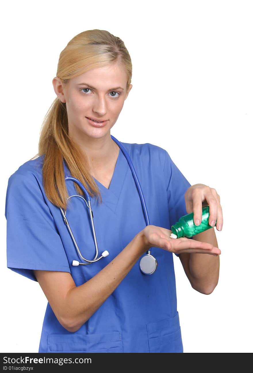 Nurse pouring bills into her hand isolated on white