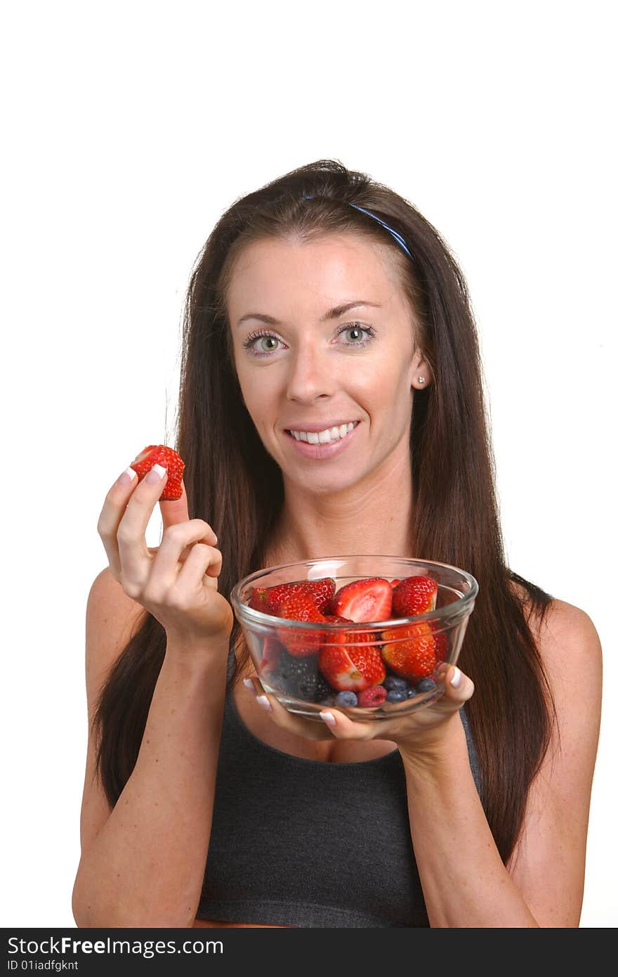 Fitness Woman Eating Fresh Fruit