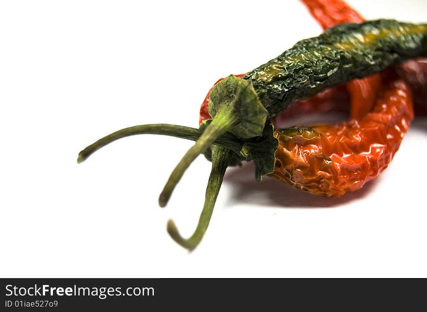 Large dried chillies isolated on white background