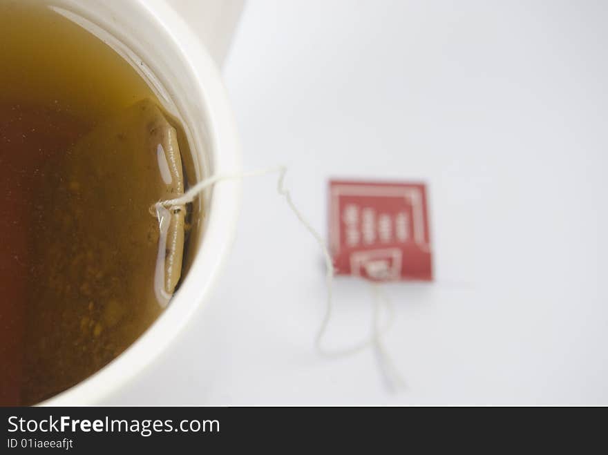 Close-up of a  white cup of tea