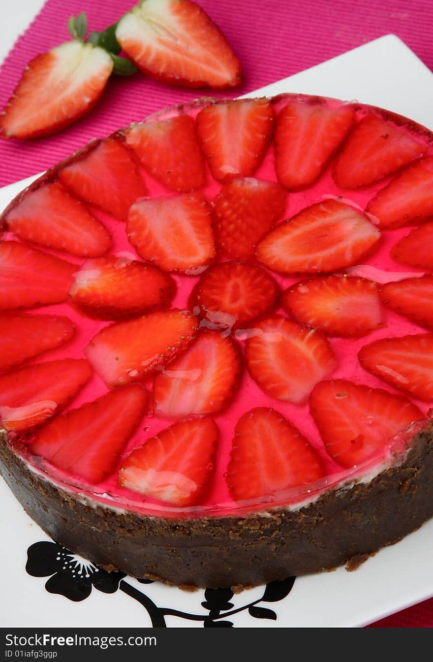 Cake with strawberry fruit on plate