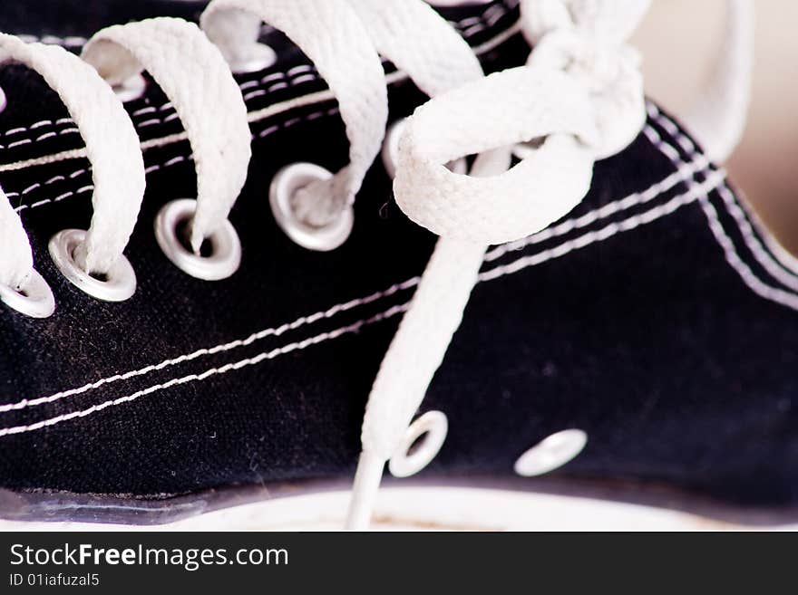 Detail of shoe laces on fashion trainers. Detail of shoe laces on fashion trainers