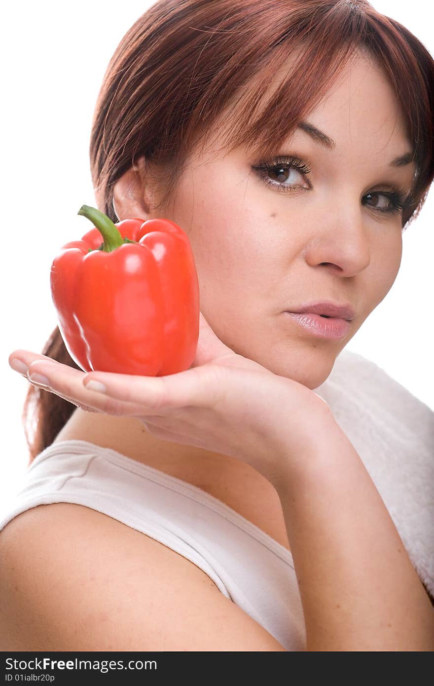 Healthy woman with pepper. over white background. Healthy woman with pepper. over white background