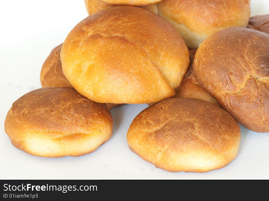 Fresh small bread on a light background. Fresh small bread on a light background