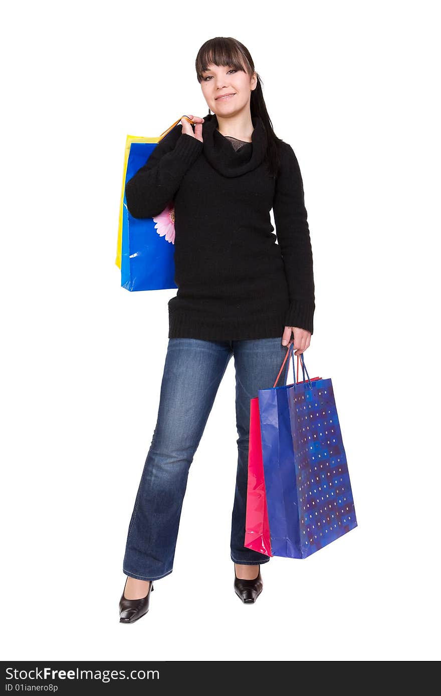 Attractive brunette woman with shopping bags