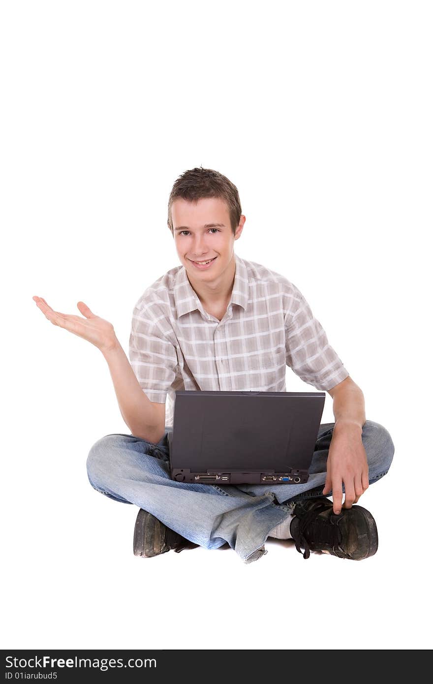 Casual teenager with laptop. over white background. Casual teenager with laptop. over white background