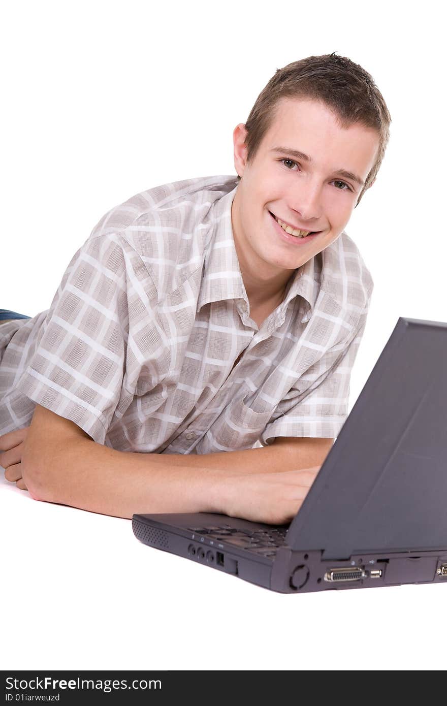 Casual teenager with laptop. over white background. Casual teenager with laptop. over white background