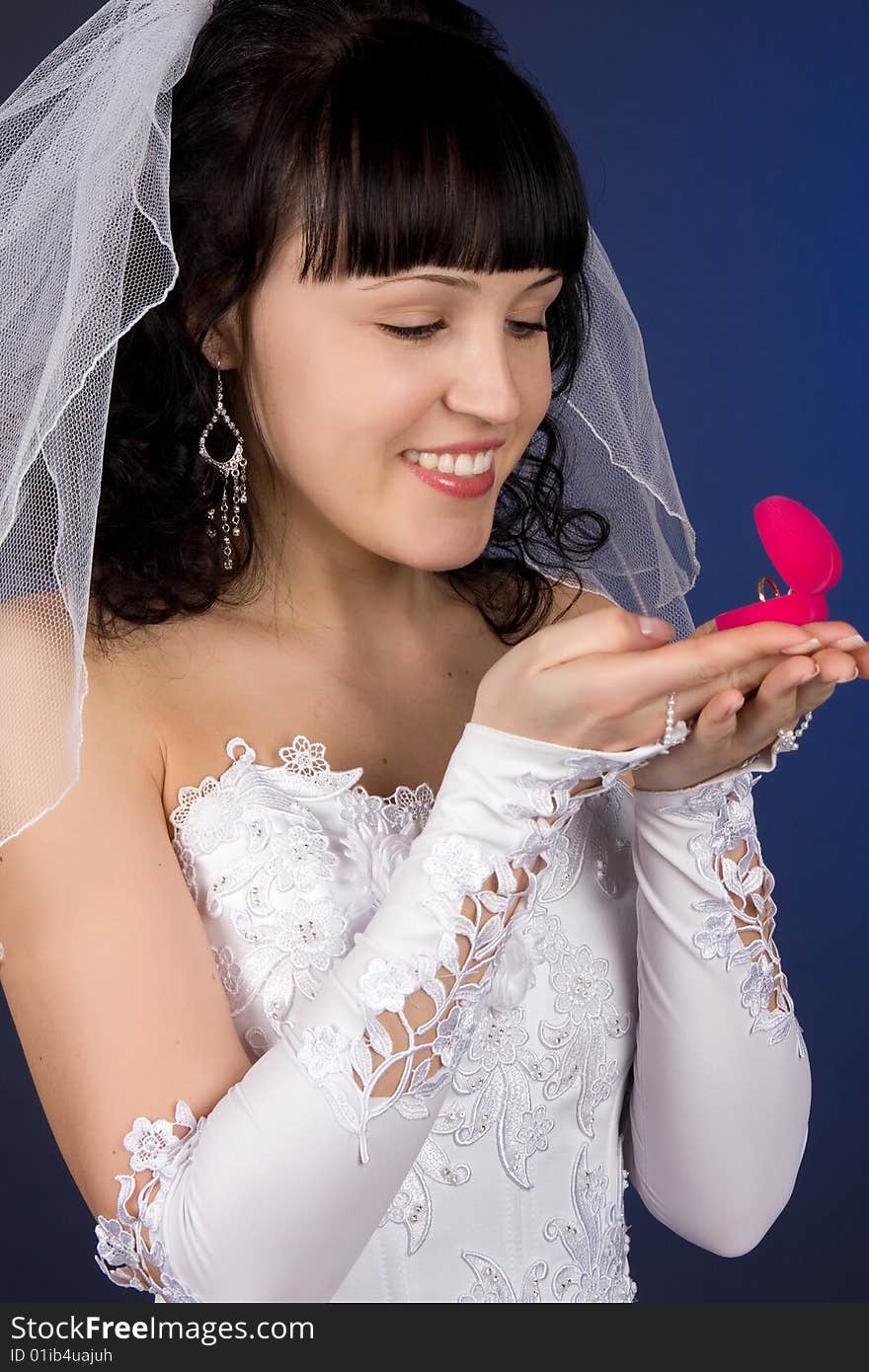 Beautiful Bride Looking At Wedding Ring