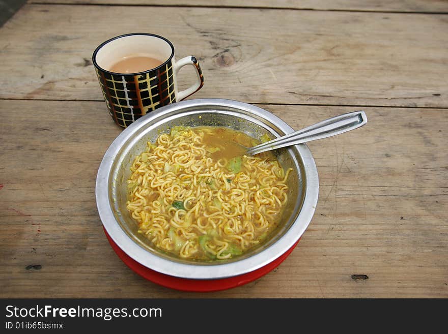 Lunch time meal for Annapurna trekkers consists of some hot noodle soup and a tea. Lunch time meal for Annapurna trekkers consists of some hot noodle soup and a tea