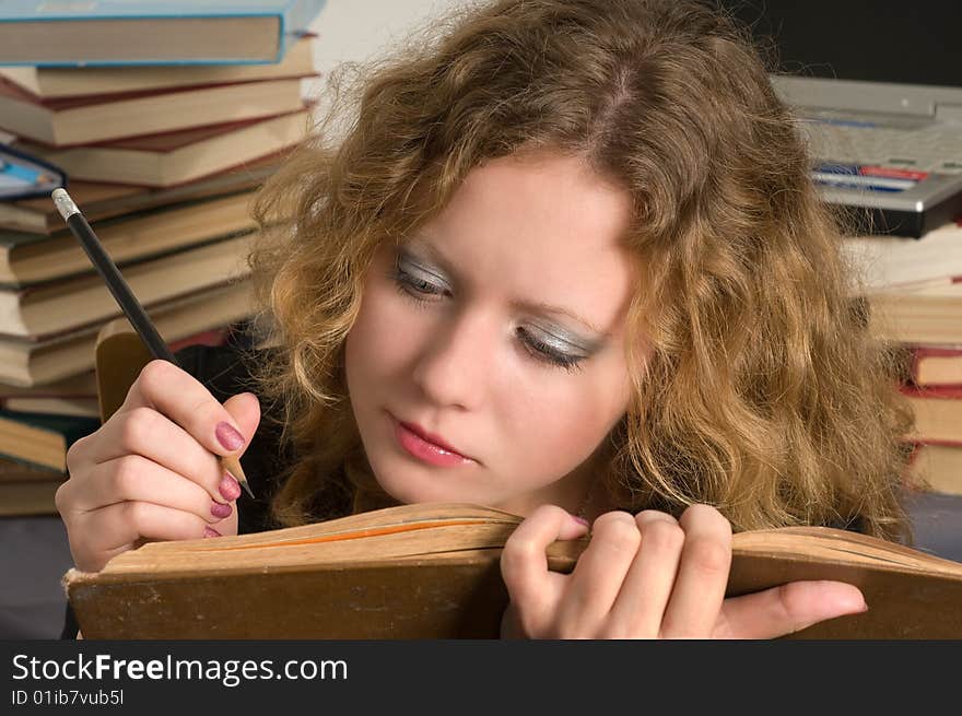 The young woman prepares for examinations. The young woman prepares for examinations.