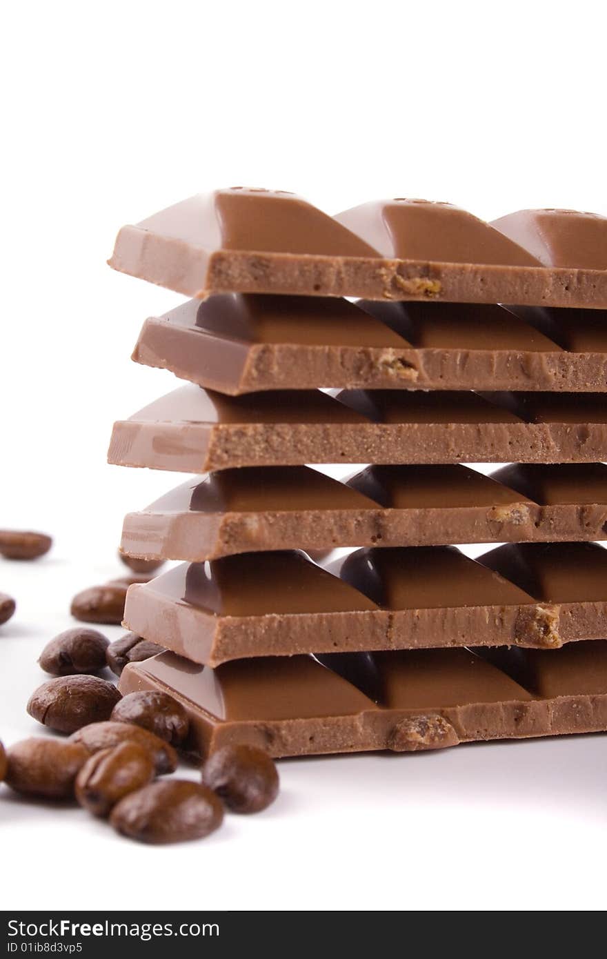 Chocolate and coffee beans on white background