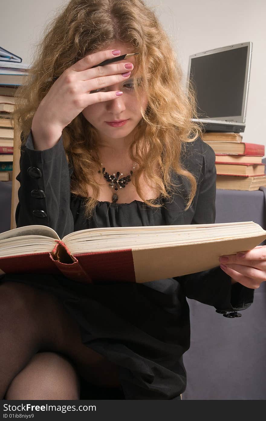 The young woman prepares for examinations. The young woman prepares for examinations.