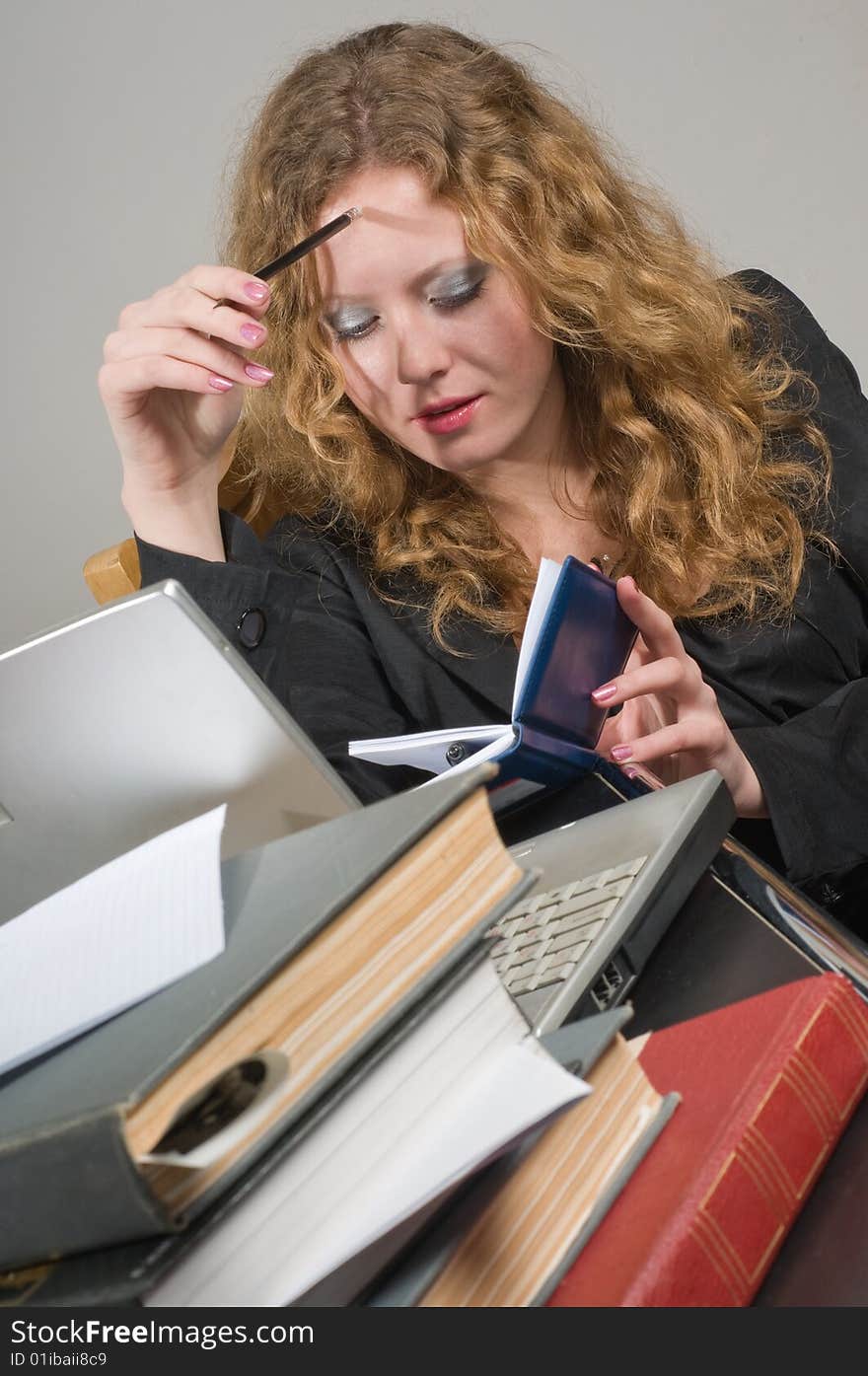 The young woman prepares for examinations. The young woman prepares for examinations.