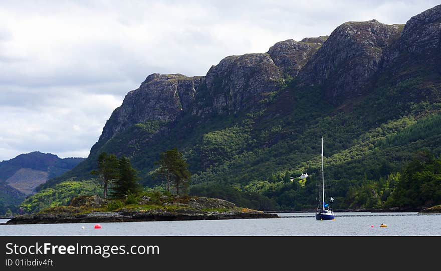 Sailboat Upon Loch Carron With Mountains