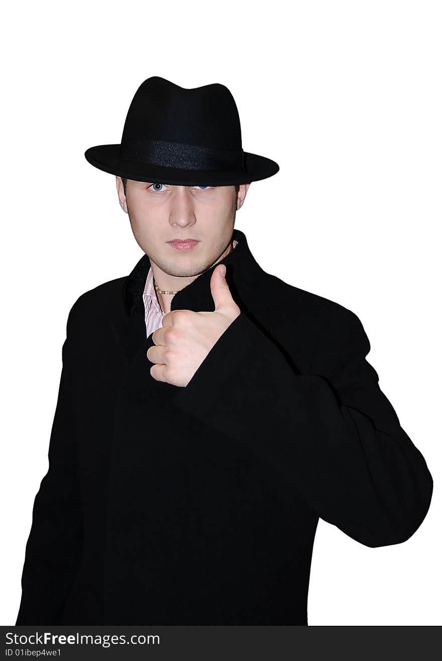 The gentleman in a hat and in a coat on a white background