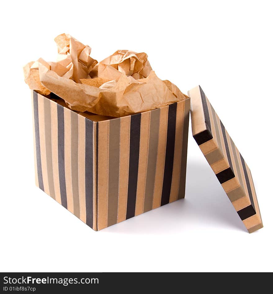 Isolated open gift box with craft paper inside