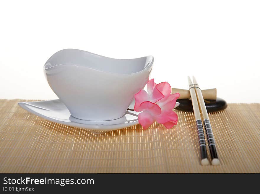 Sushi Place Setting: plate with chopsticks and flower. Sushi Place Setting: plate with chopsticks and flower