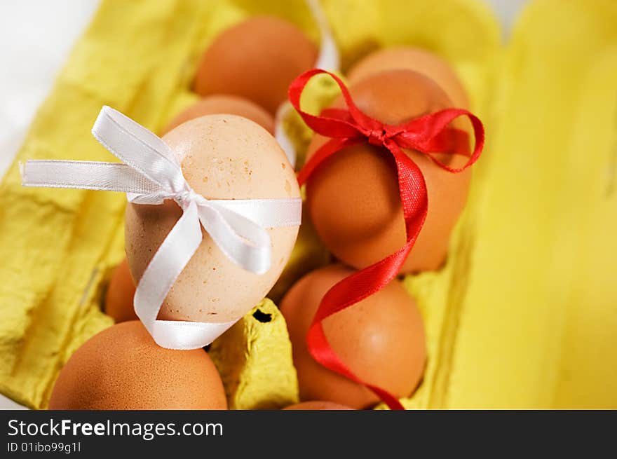 Eggs with red and white baw, easter concept. Eggs with red and white baw, easter concept