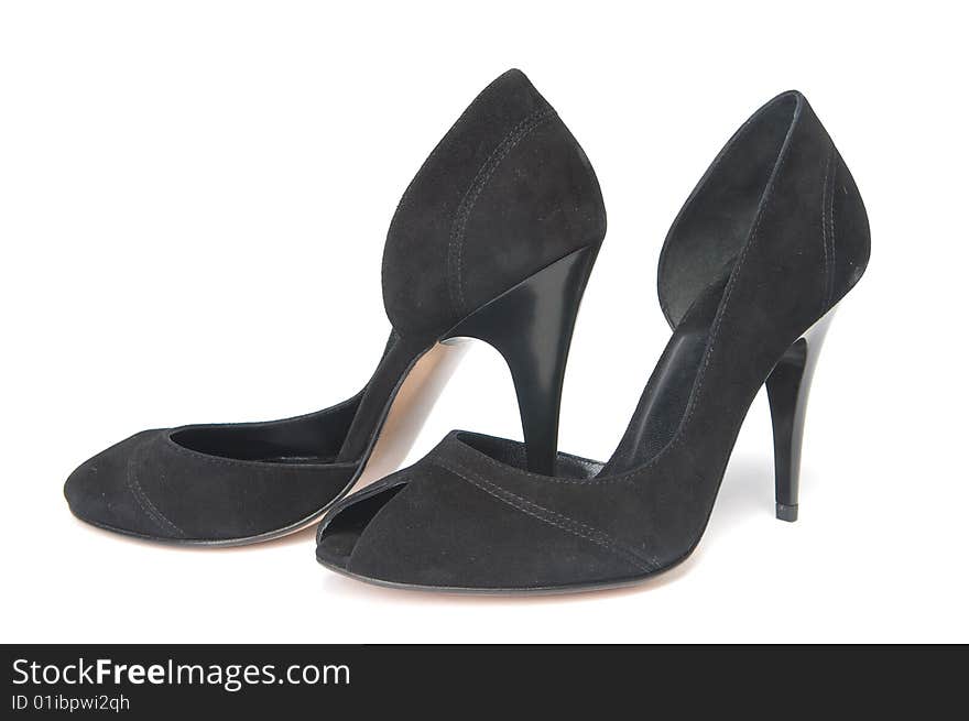 Pair of black female shoes, isolated on white background