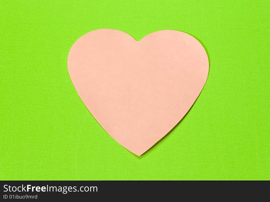 Heart made of pink paper as background. Heart made of pink paper as background