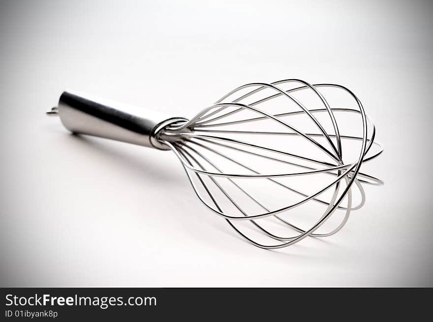 Closeup of a silver kitchen whisk