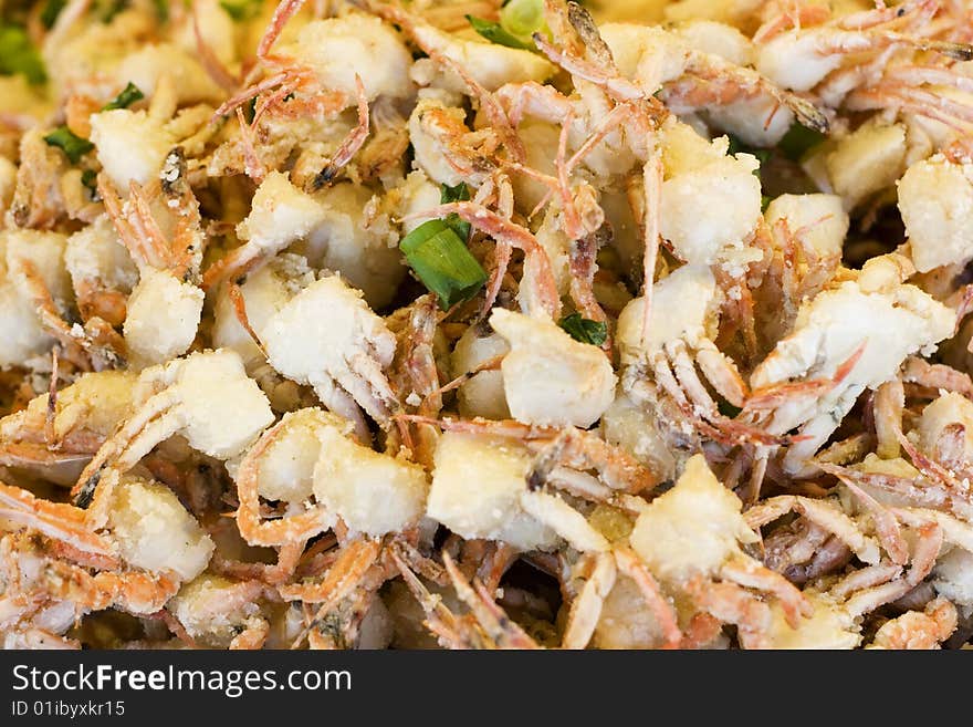 Cooked baby crabs.  Cooked with spring onions and salt.  This makes them slightly crunchy.