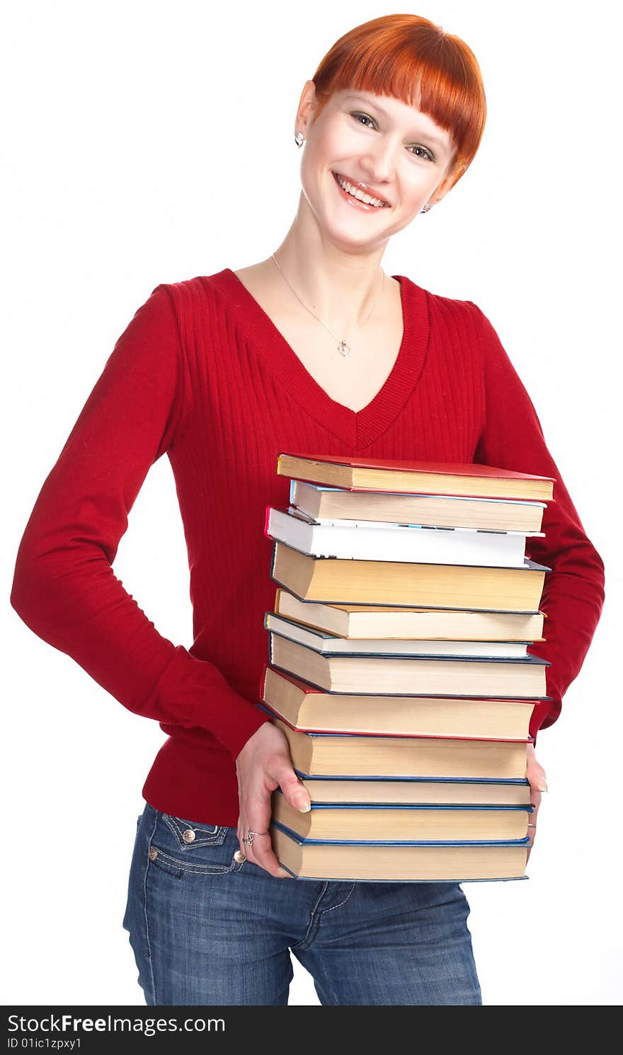 Young redhaired girl with book on white background