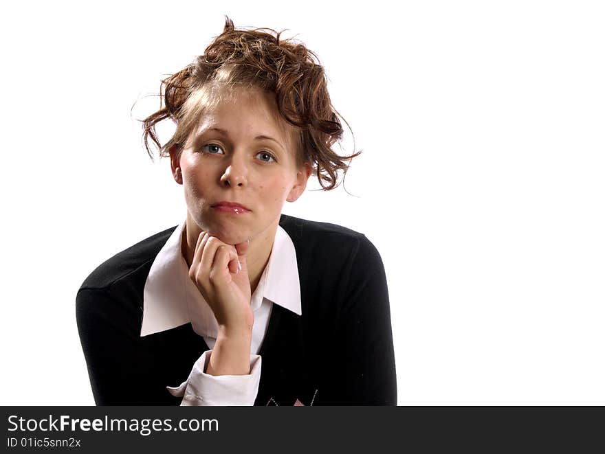 Female Model Looking at Camera in Business Attire with chin resting on her hand. Female Model Looking at Camera in Business Attire with chin resting on her hand