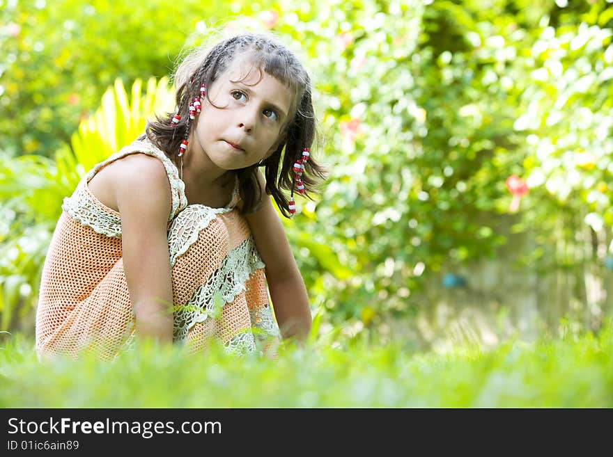 Portrait of little girl having good time in summer environment. Portrait of little girl having good time in summer environment