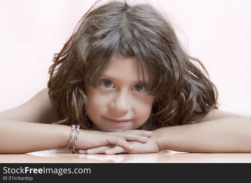 Studio portrait of  nice little girl having good time. Studio portrait of  nice little girl having good time