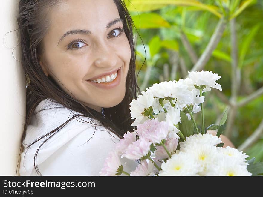 Portrait of young pretty woman in summer environment. Portrait of young pretty woman in summer environment