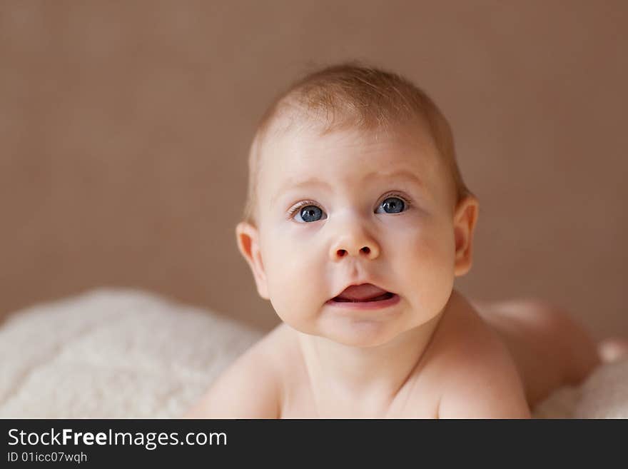 Puzzled child in the bed. Puzzled child in the bed