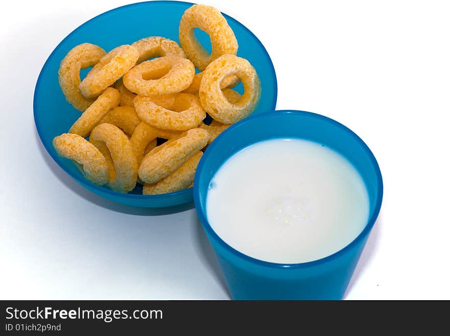 Corn Flakes and milk on the white background