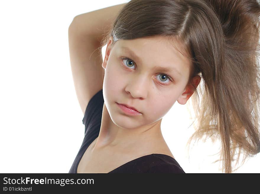 The little cute girl isolated on the white background