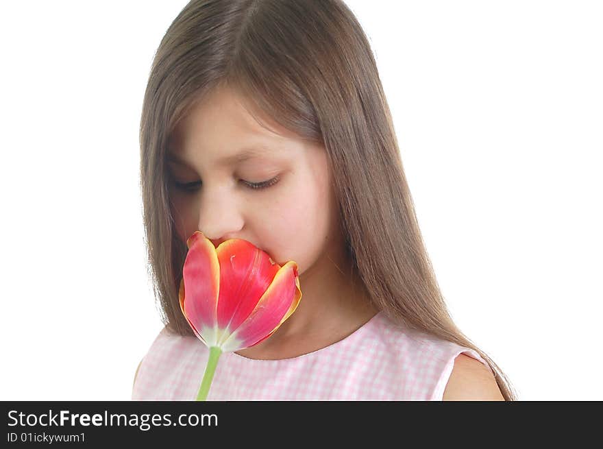 The portrait of little cute girl with flower