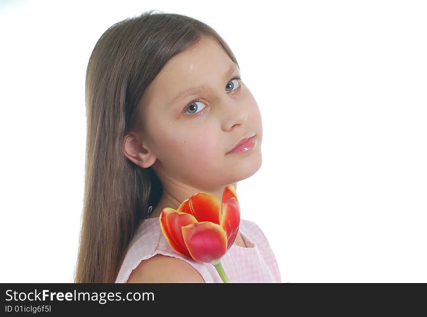 The portrait of little cute girl with flower