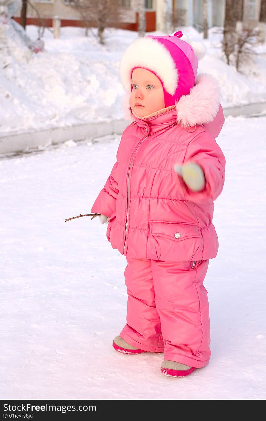 Pretty little girl in winter outerwear.